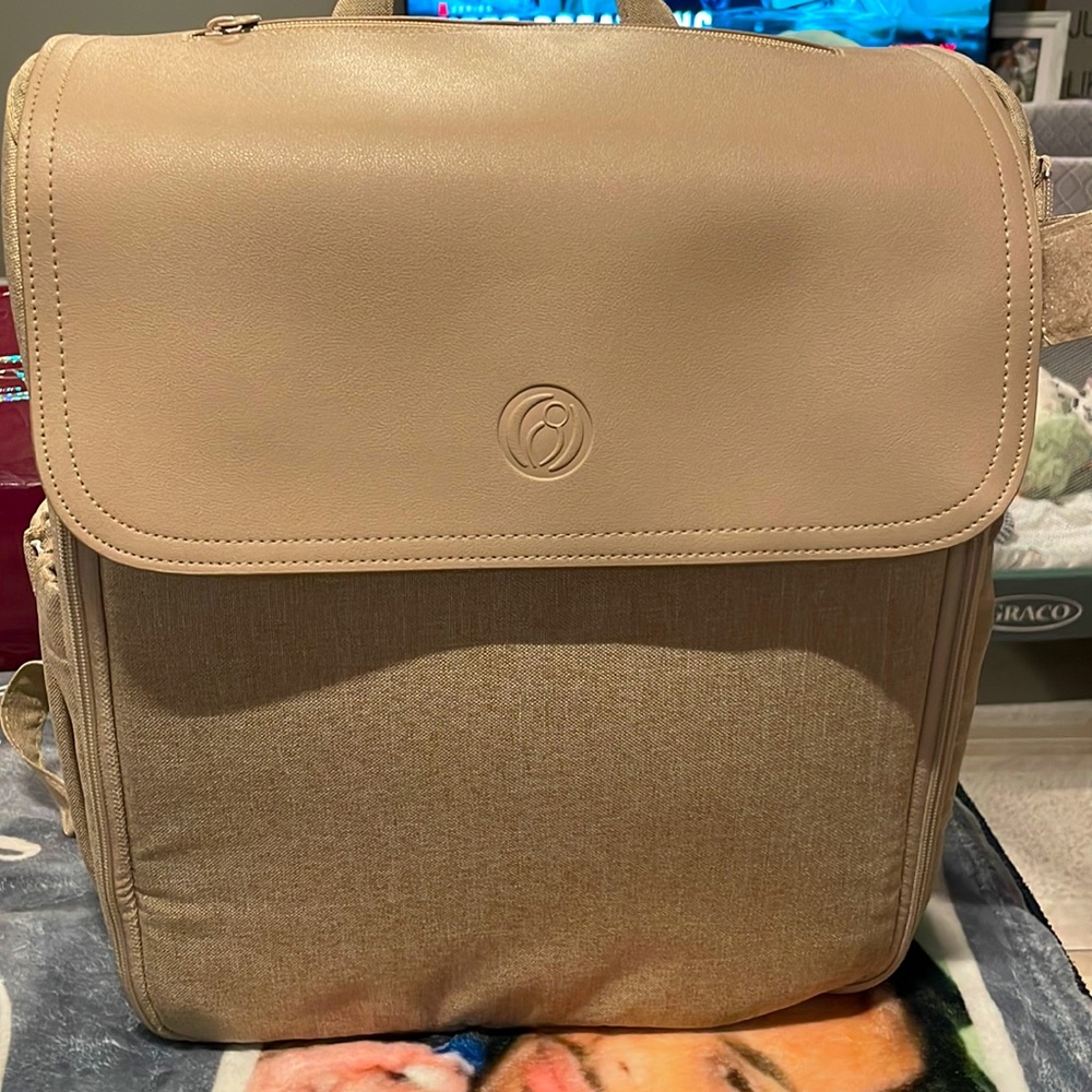 Lulyboo diaper bag/changing station with removable stroller caddy